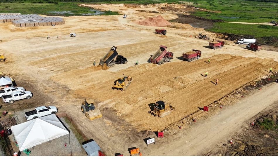 Fleet mobilised in parallel, graders, rollers, and haul trucks staged by section